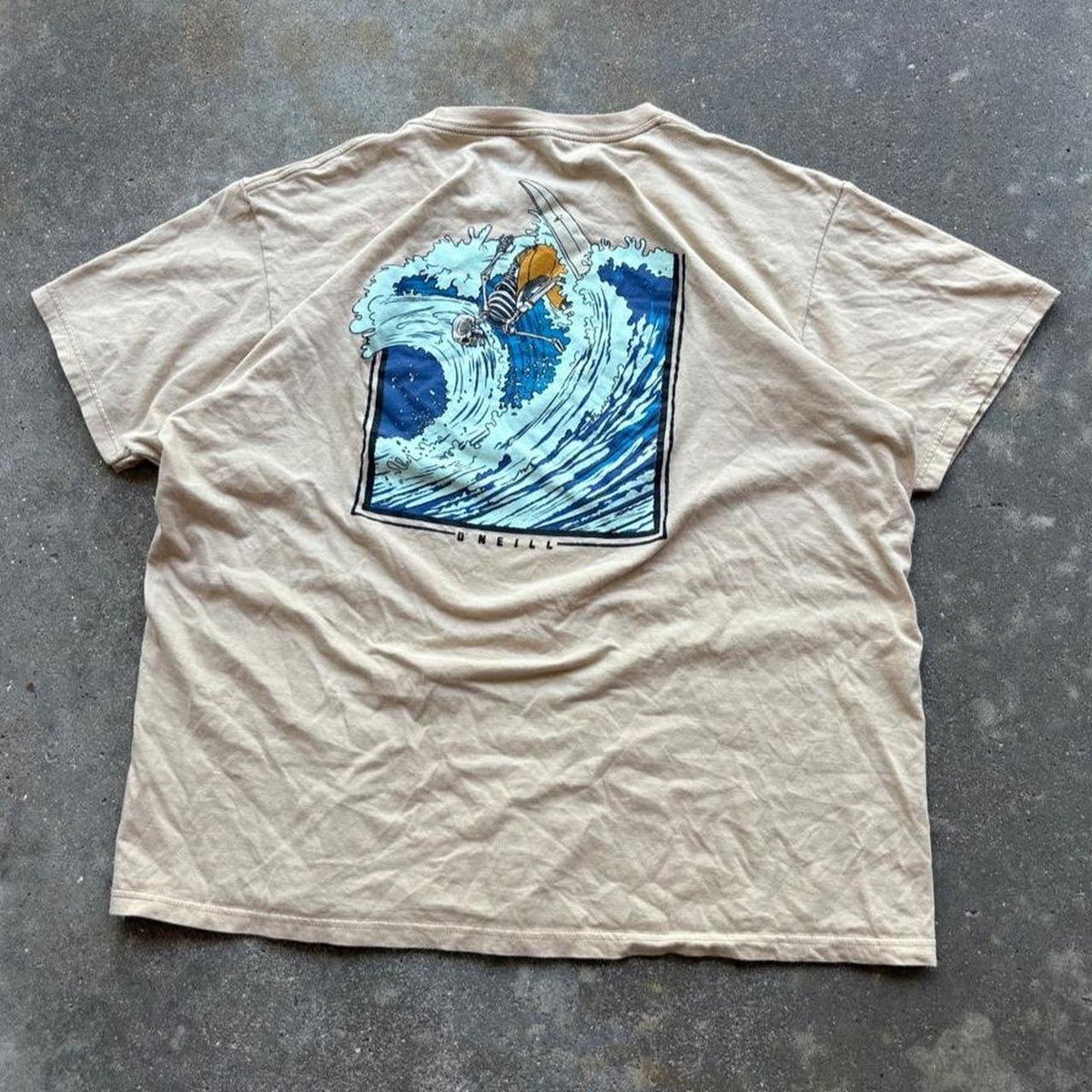 O'Neill Surf Tee with blue wave graphic featuring a